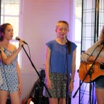 Vocal Students from World Heart Beat Music Academy in London performing for an audience