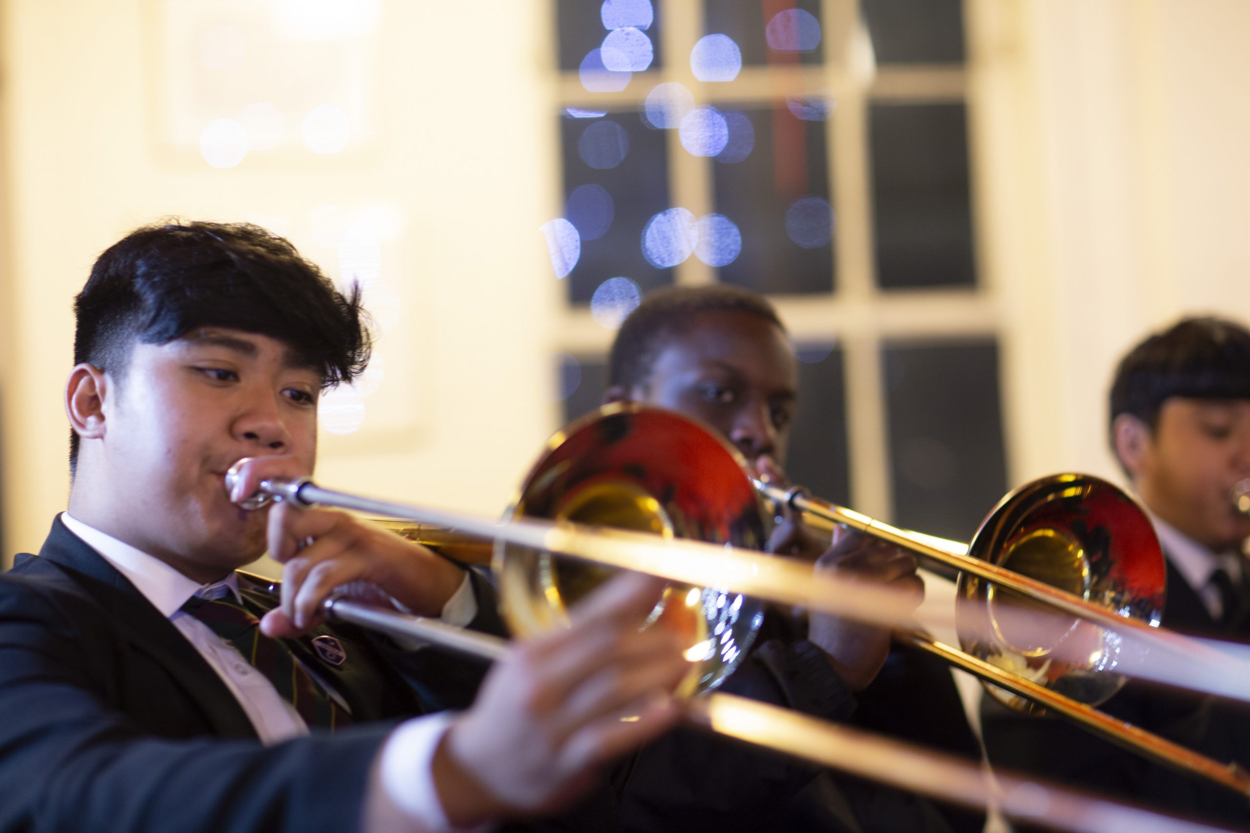 Young players with trombones