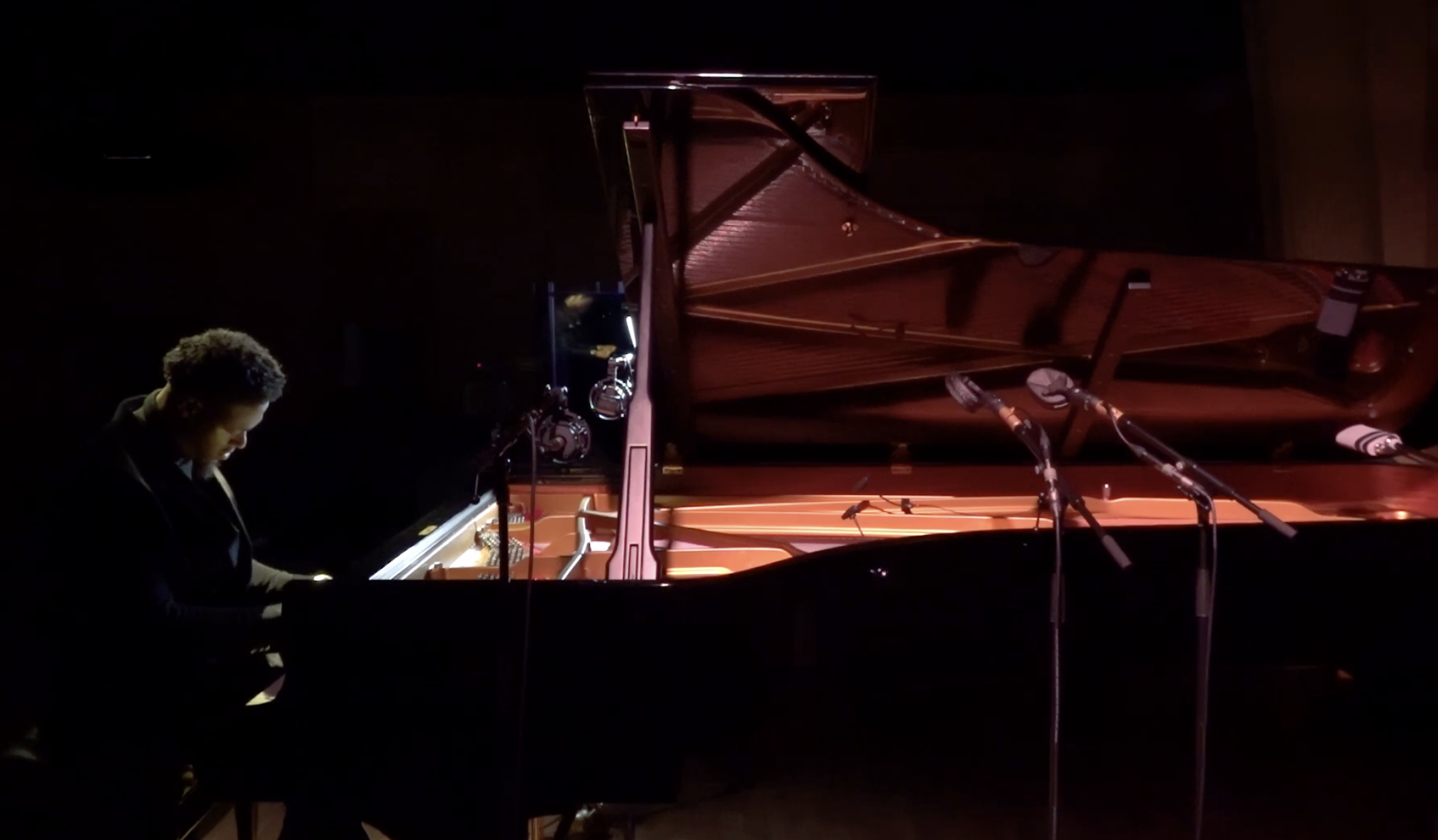 Josiah Wade playing a Steinway Model D Grand Piano