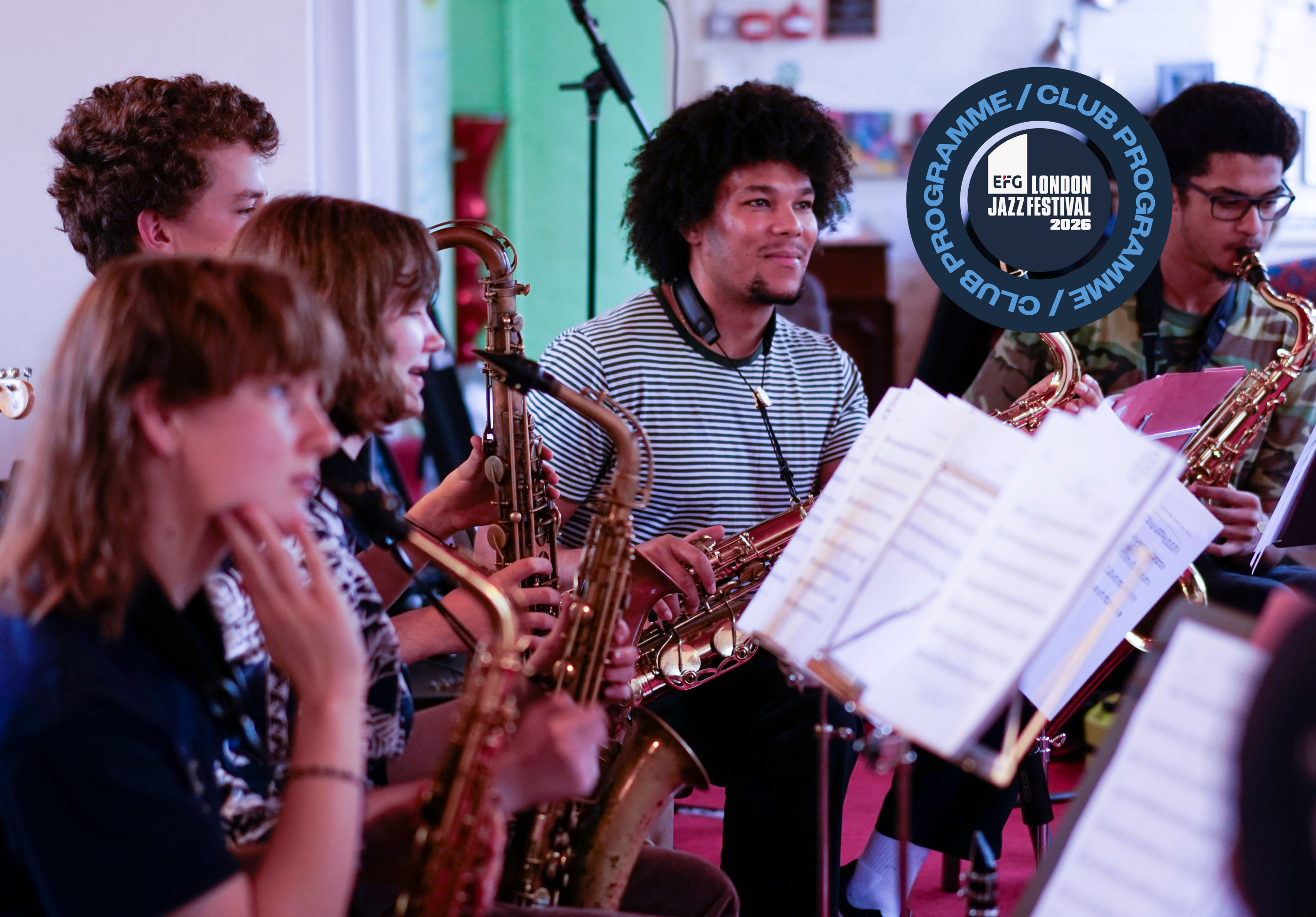 Young musicians with instruments playing together.
