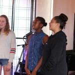 Vocal Students from World Heart Beat Music Academy in London performing for an audience