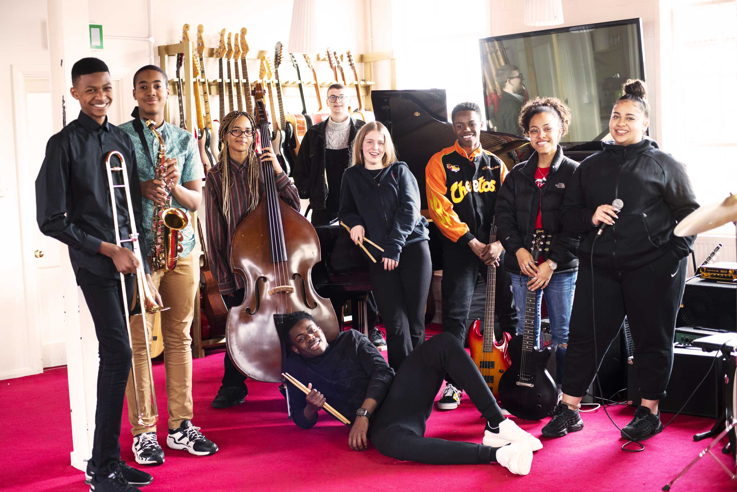 Young musicians enjoying the world heart beat music academy